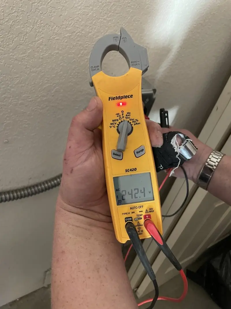 Voltage testing with clamp meter during Generator Installation in Baldwin Park